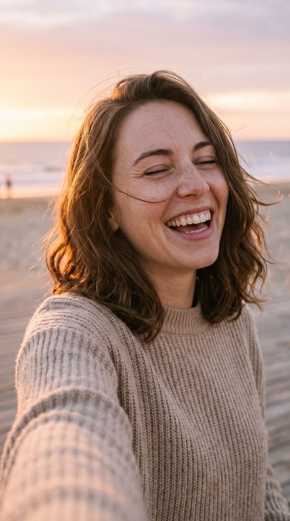 Take 1: sunset selfie, subject mid-laugh with eyes closed